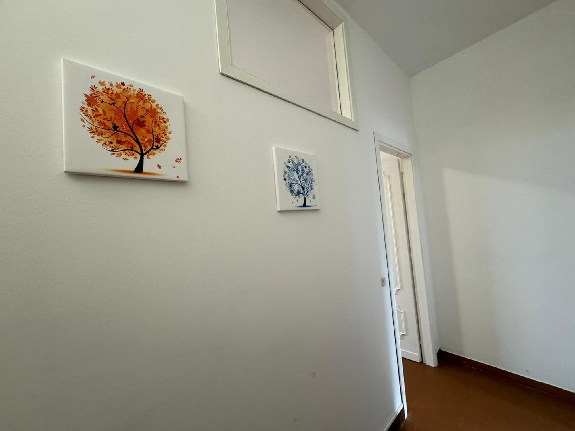 Hotel Monastero Ss. Annunziata Todi Exterior foto A wall painted with a white emulsion paint